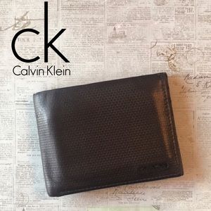 Calvin Klein Textured Leather Bi-Fold Wallet